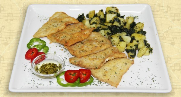 Pohovani fileti oslića sa prilogom